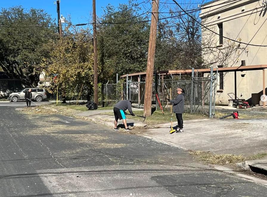 Volunteers cleaning up the grounds